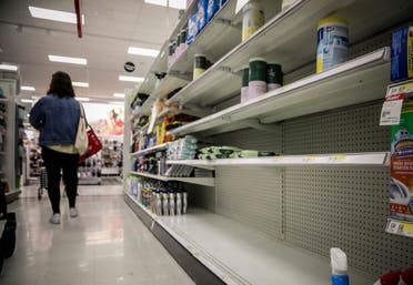 Empty shelves for disinfectant wipes wait for restocking, as concerns grow around COVID-19, in New York. (AP)