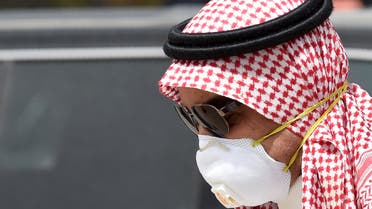 A Saudi man wearing a protective mask as a precaution against COVID-19 coronavirus disease in Riyadh on March 15, 2020. (AFP)