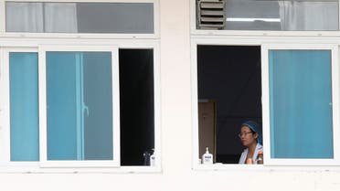A health worker is seen at Vietnam's largest hospital, Bach Mai, where coronavirus cases have been detected in Hanoi, Vietnam March 26, 2020. REUTERS/Kham
