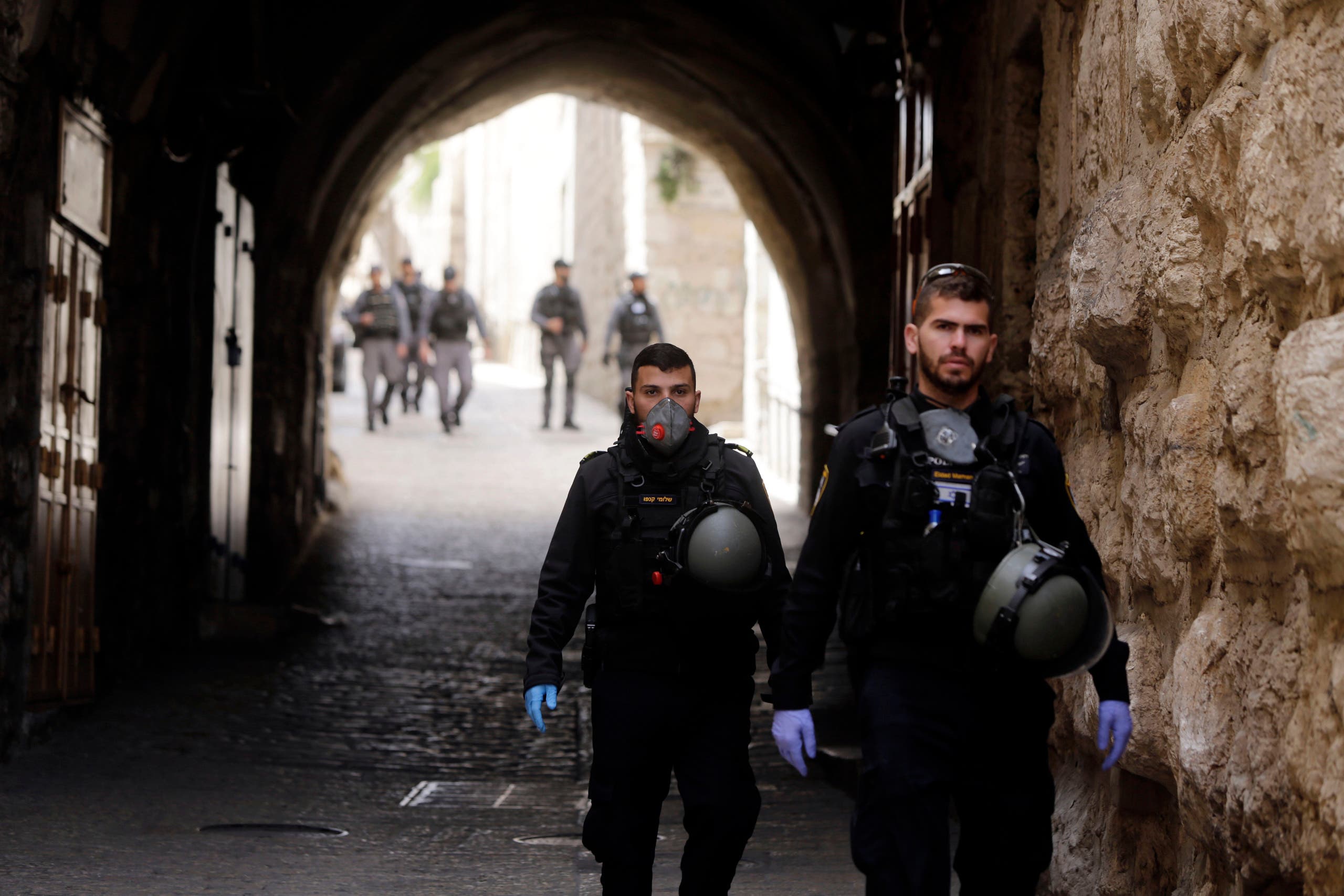 Israeli police patrol deserted street in Jerusalem's Old City, in Jerusalem on March 23, 2020. (AP)