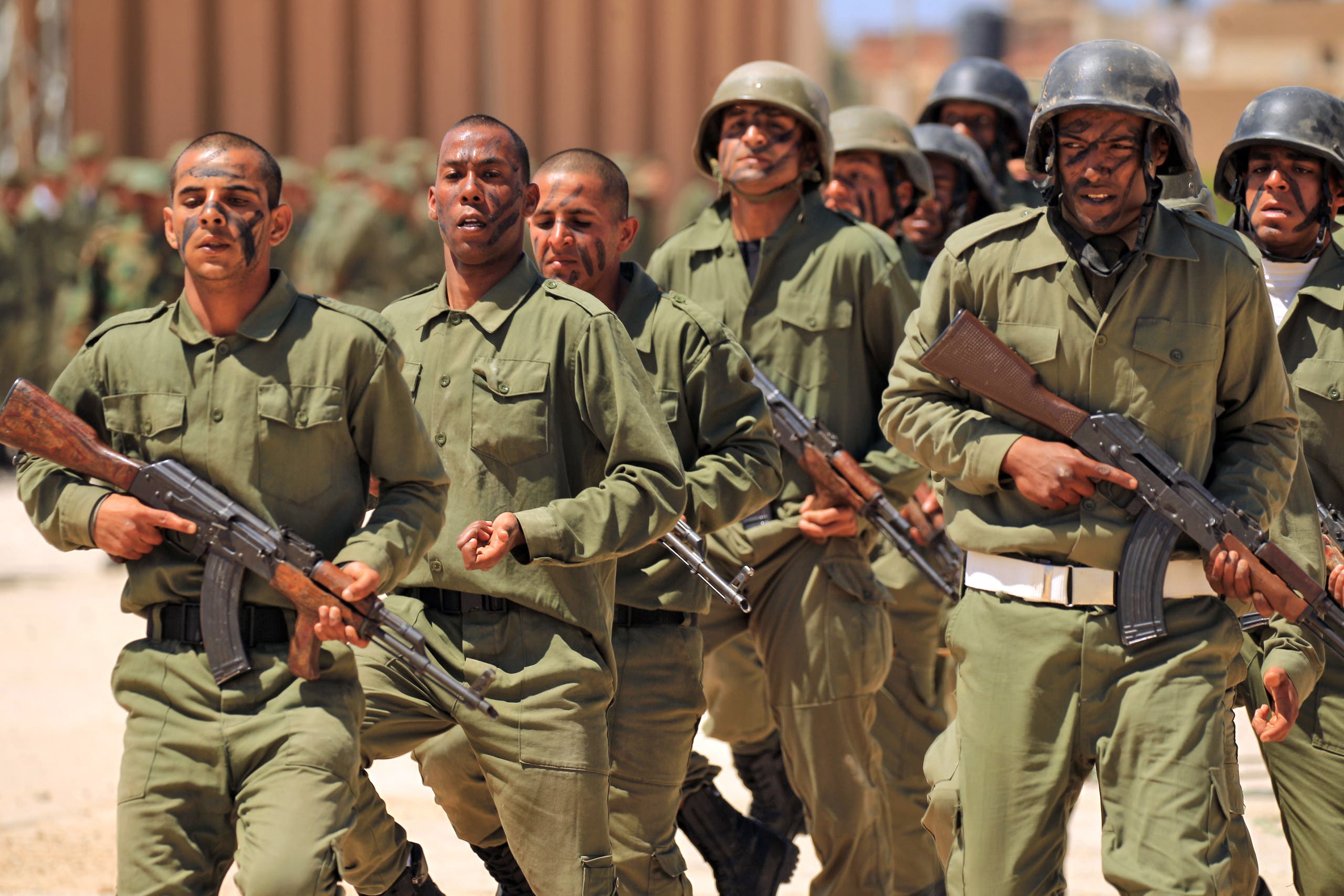 Fighters from the Libyan National Army attend their graduation ceremony at a military academy in Libya's eastern city of Benghazi on April 17, 2019. (AP)