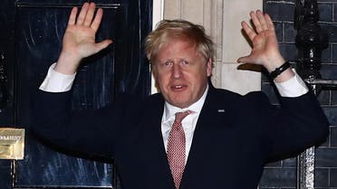 Britain's Prime Minister Boris Johnson applauds outside 10 Downing Street during the Clap For Our Carers campaign in support of the NHS, as the spread of the coronavirus disease (COVID-19) continues, London, Britain, March 26, 2020. Pictre taken March 26, 2020. REUTERS/Hannah McKay