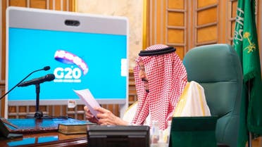 Saudi King Salman bin Abdulaziz attends via video link a virtual G20 summit on coronavirus disease (COVID-19), in Riyadh, Saudi Arabia March 26, 2020. Bandar Algaloud/Courtesy of Saudi Royal Court/Handout via REUTERS ATTENTION EDITORS - THIS PICTURE WAS PROVIDED BY A THIRD PARTY.