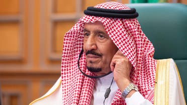 Saudi King Salman bin Abdulaziz attends via video link a virtual G20 summit on coronavirus disease (COVID-19), in Riyadh, Saudi Arabia March 26, 2020. Bandar Algaloud/Courtesy of Saudi Royal Court/Handout via REUTERS ATTENTION EDITORS - THIS PICTURE WAS PROVIDED BY A THIRD PARTY.