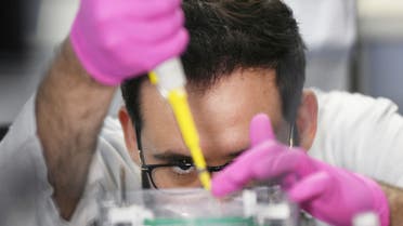 A researcher from the Institute of Biology at the Federal University of Rio de Janeiro (UFRJ) works to develop a new test capable of detecting in people with suspected of the coronavirus disease (COVID-19) in Rio de Janeiro, Brazil, March 25, 2020.