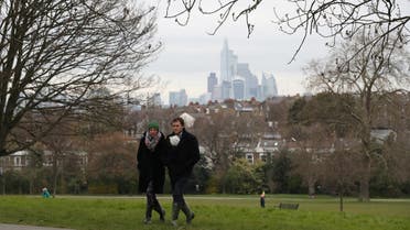 People walk in Brockwell Park, as the spread of the coronavirus disease (COVID-19) continues, London, Britain, March 30, 2020. (Reuters)