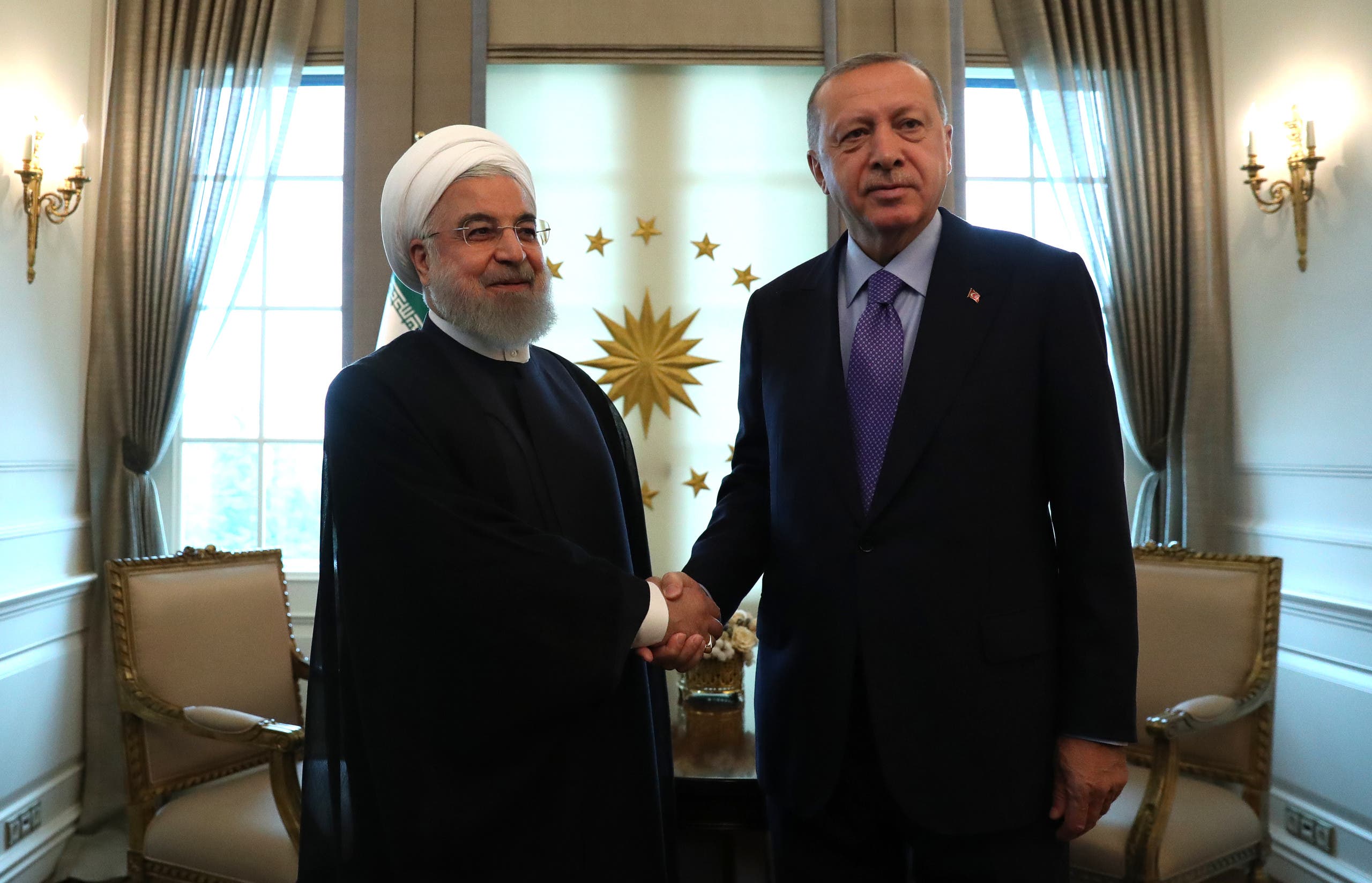 أردوغان وروحاني في أنقرة (أرشيفية من فرانس برس)
