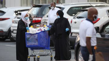 Women leave a supermarket, following the outbreak of the coronavirus disease (COVID-19), in Dubai. (Reuters)