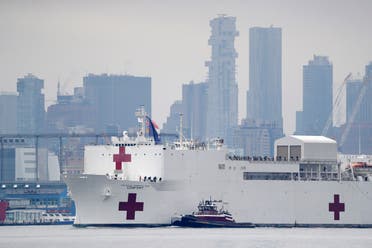 The Navy hospital ship USNS Comfort passes lower Manhattan on its way to docking in New York on March 30, 2020. (AP)