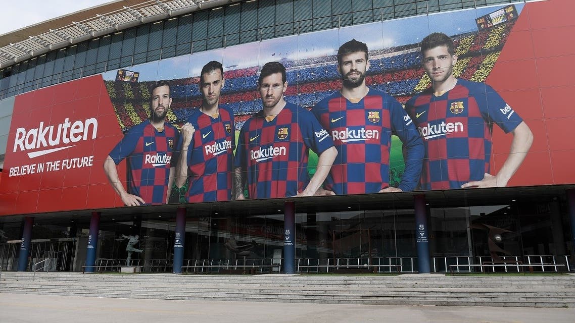 A picture shows the empty entrance to the Camp Nou stadium in Barcelona on March 13, 2020 after La Liga said Spain's top two divisions would be suspended for at least two weeks over the coronavirus outbreak. (Reuters)