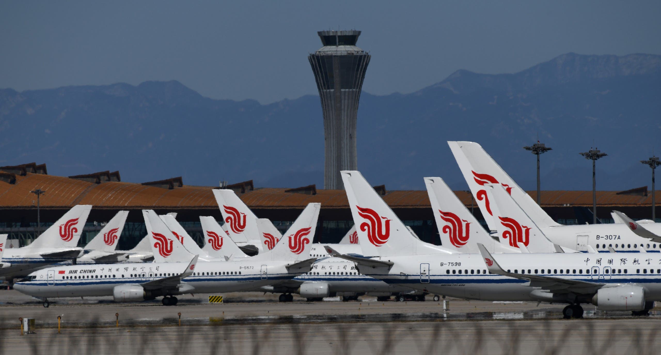 Air China planes seen parked on the tarmac at Beijing Capital Airport, China, during the coronavirus pandemic. (File photo: AFP)