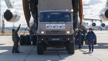  A military truck with stickers reading “From Russia with love” loading a military plane in Moscow as Russia prepares to send medical personnel and supplies to Italy to help the country’s efforts against the coronavirus. (AP)
