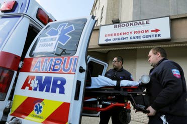 E.M.Ts load a bed into an ambulance outside the Brookdale Hospital Medical Center during the coronavirus disease (COVID-19) outbreak in Brooklyn, New York City, New York, U.S., April 1, 2020. (Reuters)