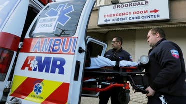 E.M.Ts load a bed into an ambulance outside the Brookdale Hospital Medical Center during the coronavirus disease (COVID-19) outbreak in Brooklyn, New York City.  (Reuters)