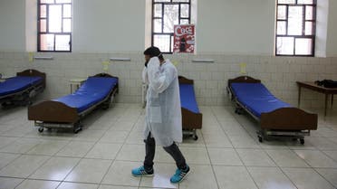 A hospital worker is seen among hospital beds prepared in anticipation of patients with coronavirus disease (COVID-19) at San Felipe Hospital, in Tegucigalpa, Honduras. (Reuters)