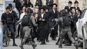 Coronavirus: Ultra-orthodox Jews cough on Israeli police, calling them 'Nazis'