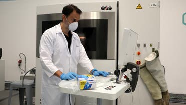 CEO of Immensa Technology Labs, uses a 3D laser printer to produce components for face shields, following the outbreak of the coronavirus disease (COVID-19), in Dubai, United Arab Emirates, March 30, 2020. (Reuters)