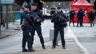Armed man holds two hostages at French bank, frees four in port city  of Le Havre