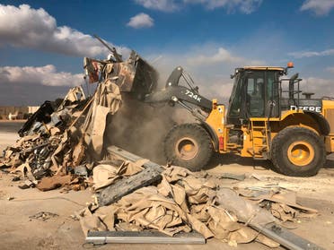 A bulldozer clears rubble and debris at Ain al-Asad air base in Anbar, Iraq, Monday, Jan. 13, 2020. Ain al-Asad air base was struck by a barrage of Iranian missiles in retaliation for the US drone strike. (File photo: AP)