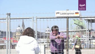 Coronavirus divides lovers, friends at border fences between Germany and Switzerland