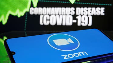 FILE PHOTO: FILE PHOTO: Zoom logo is seen in front of diplayed coronavirus disease (COVID-19) in this illustration taken March 19, 2020. REUTERS/Dado Ruvic/Illustration - RC20NF9U5BJ8/File Photo/File Photo
