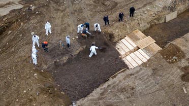 22  Drone pictures show bodies being buried on New York's Hart Island, where the department of corrections is dealing with more burials overall, amid the coronavirus disease (COVID-19) outbreak in New York City, U.S., April 9, 2020. REUTERS/Lucas Jackson