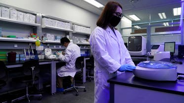Researchers demonstrate samples of iLAMP Novel-Coronavirus Detection Kit at an iONEBIO's office in Seongnam, South Korea, March 26, 2020. Picture taken March 26 2020. REUTERS/Kim Hong-Ji