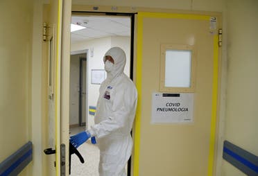 A member of the medical staff enters the coronavirus disease (COVID-19) unit at San Filippo Neri hospital in Rome, Italy April 9, 2020. (Reuters)