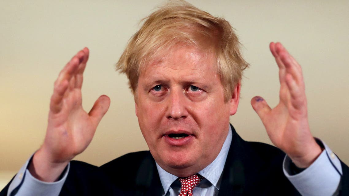 FILE PHOTO: British Prime Minister Boris Johnson holds a news conference addressing the government's response to the coronavirus outbreak, at Downing Street in London, Britain March 12, 2020. To match Special Report HEALTH-CORONAVIRUS/BRITAIN-PATH REUTERS/Simon Dawson/Pool/File Photo
