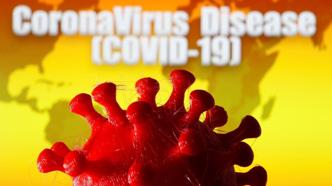 A 3D-printed coronavirus model is seen in front of a world map and the words CoronaVirus Disease (Covid-19) on display in this illustration taken March 25, 2020. (Reuters)