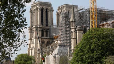A view shows the Notre-Dame de Paris Cathedral, which was damaged in a devastating fire one year ago, as the coronavirus disease (COVID-19) lockdown slows down its restoration in Paris, France, April 11, 2020. Picture taken April 11, 2020. REUTERS/Charles Platiau