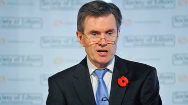 Britain's Secret Intelligence Service (SIS) chief John Sawers addresses a live televised gathering of academics, officials and editors in London October 28, 2010. Britain's top spy makes the first public speech by a serving UK espionage chief on Thursday, a step towards greater openness for an intelligence service that for most of the 20th century did not officially exist. REUTERS/Toby Melville (BRITAIN - Tags: MILITARY POLITICS CRIME LAW)