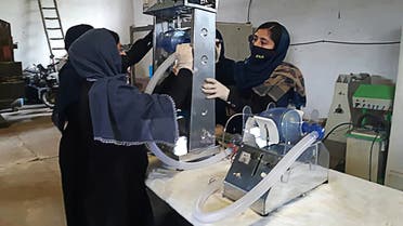 orkers of an all-female robotic team build a ventilator in preparation for COVID-19 coronavirus patients, at a workshop, in Herat. (AFP)
