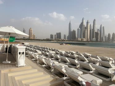 An empty beach on the Palm Jumeirah overlooking Dubai Marina. (Reuters)