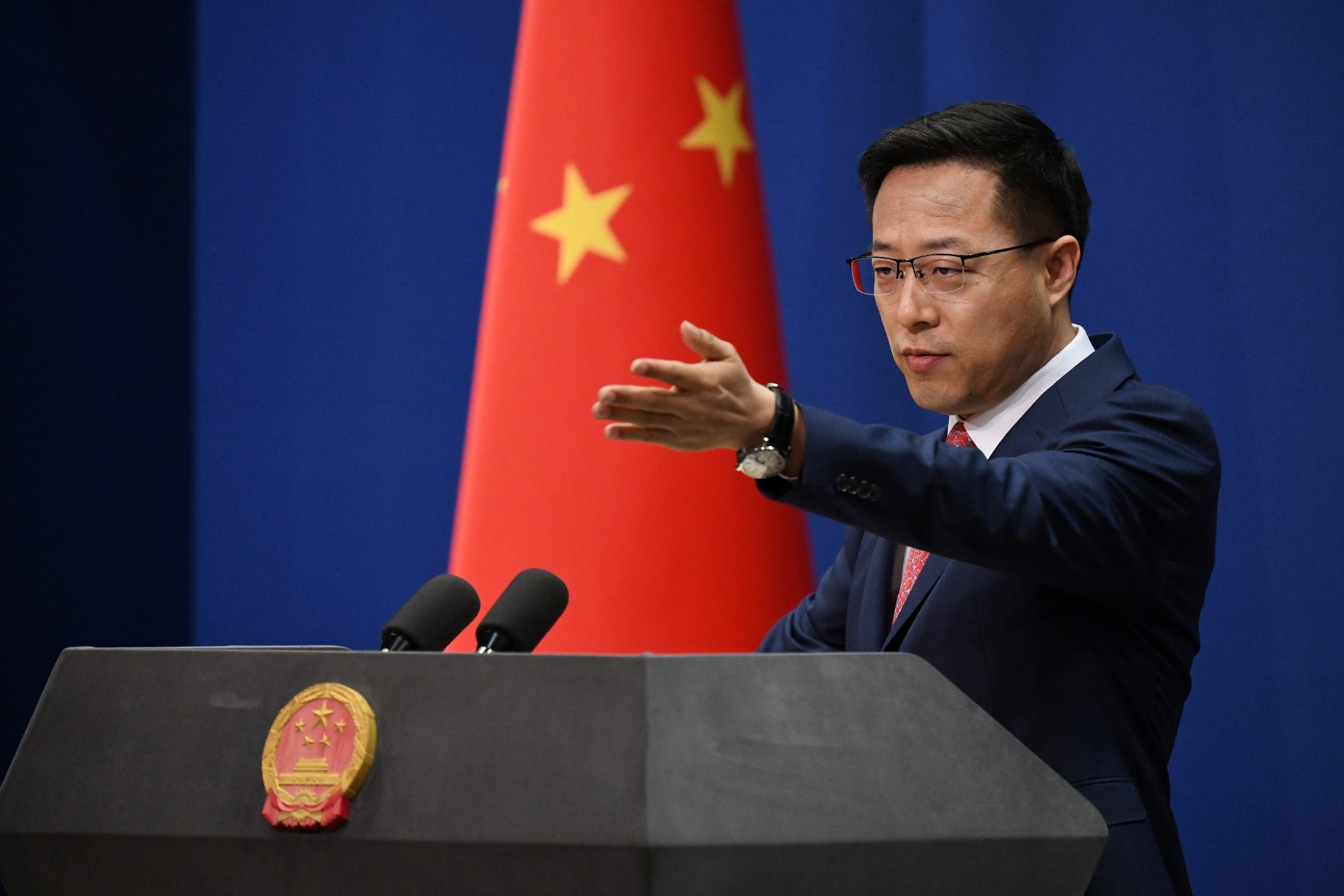 Chinese Foreign Ministry spokesman Zhao Lijian takes a question at the daily media briefing in Beijing on April 8, 2020. (AFP)