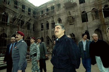 Lebanese Prime Minister Rafik al-Hariri (center) inspects February 2 restoration work at the Serail, the traditional government's headquarters since independence. The Serail is located in the central district of Beirut which was destroyed during Lebanon's 1975-1990 civil war and is being rebuilt by the country's biggest private company Solidere. (File photo: Reuters)