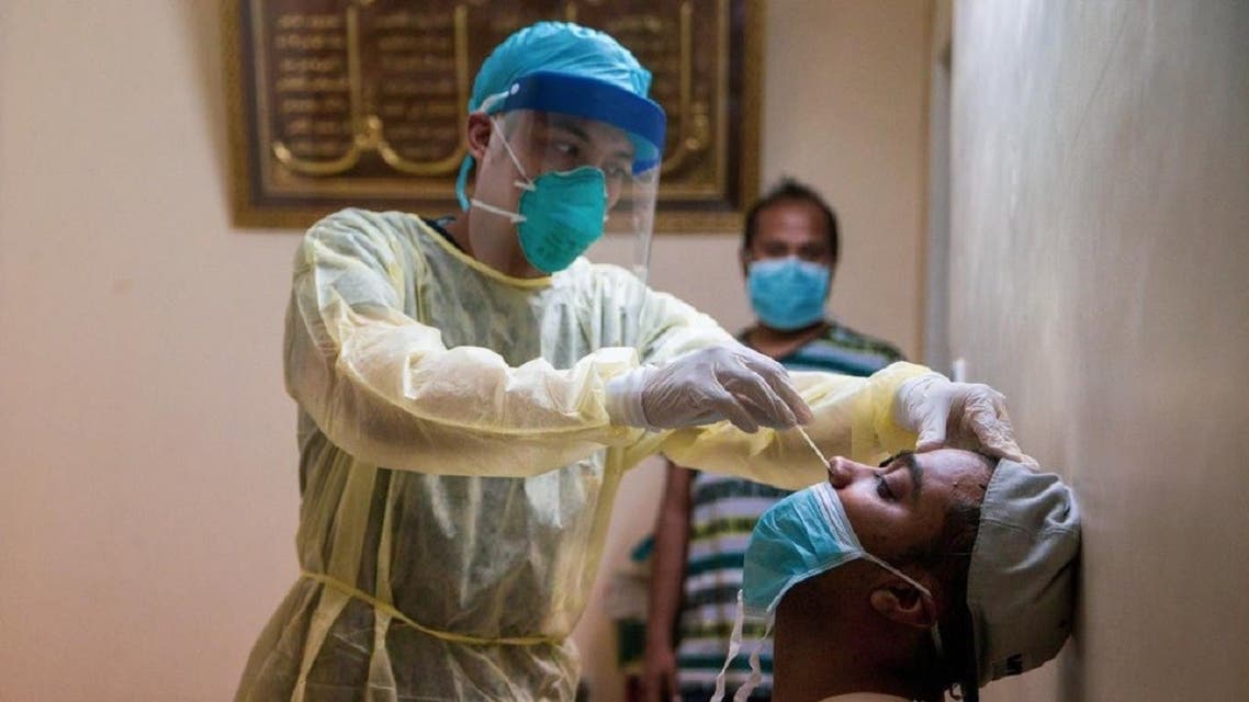 Saudi medical teams conduct coronavirus screenings in homes throughout Mecca and Medina neighborhoods. (Twitter)