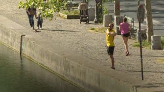 Coronavirus: Joggers, walkers get last exercise in before daily confinement in Paris