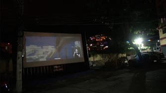 Residents treated to open-air cinema during coronavirus lockdown in Brazil