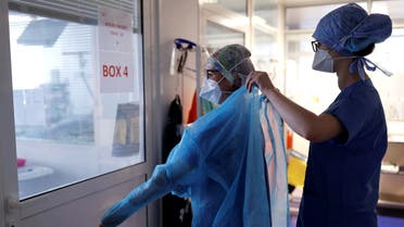 A medical staff member gets ready to work in an intensive care unit for coronavirus disease (COVID-19) patients at the Clinique de l'Orangerie private hospital in Strasbourg, as the spread of the coronavirus disease continues, France April 17, 2020. REUTERS/Christian Hartmann