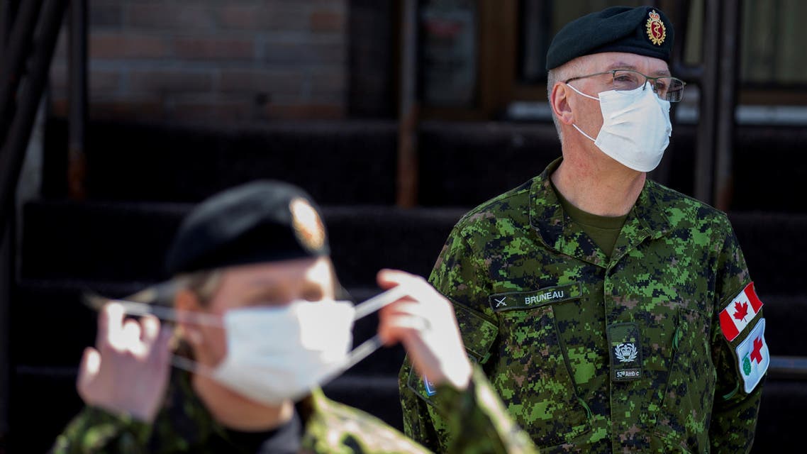 Canadian Armed Forces (CAF) medical personnel are seen at Centre d'hebergement Yvon-Brunet, a seniors' long-term care centre, as they arrive to assess and ease the ongoing situation in long-term care facilities in Quebec amid the outbreak of the coronavirus disease (COVID-19), in Montreal, Quebec, Canada April 18, 2020. REUTERS/Christinne Muschi
