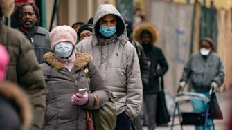 As US lifts mask requirements for vaccinated, some not ready to give up face covering