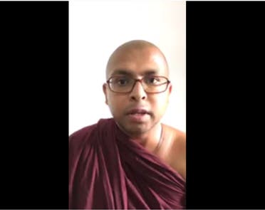 A screengrab of a Buddhist monk in Sri Lanka who filmed a video on YouTube warning people to stay indoors and alleging that Muslims had caught the virus in a village. (Screengrab)