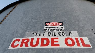 A sticker reads crude oil on the side of a storage tank in the Permian Basin in Mentone, Loving County, Texas, US. (Reuters)