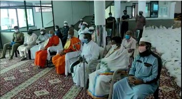 A meeting of Buddist and muslim religious leaders at a mosque in Balapokuna, Sir Lanka, to discuss coronavirus-related issues. (Screengrab)
