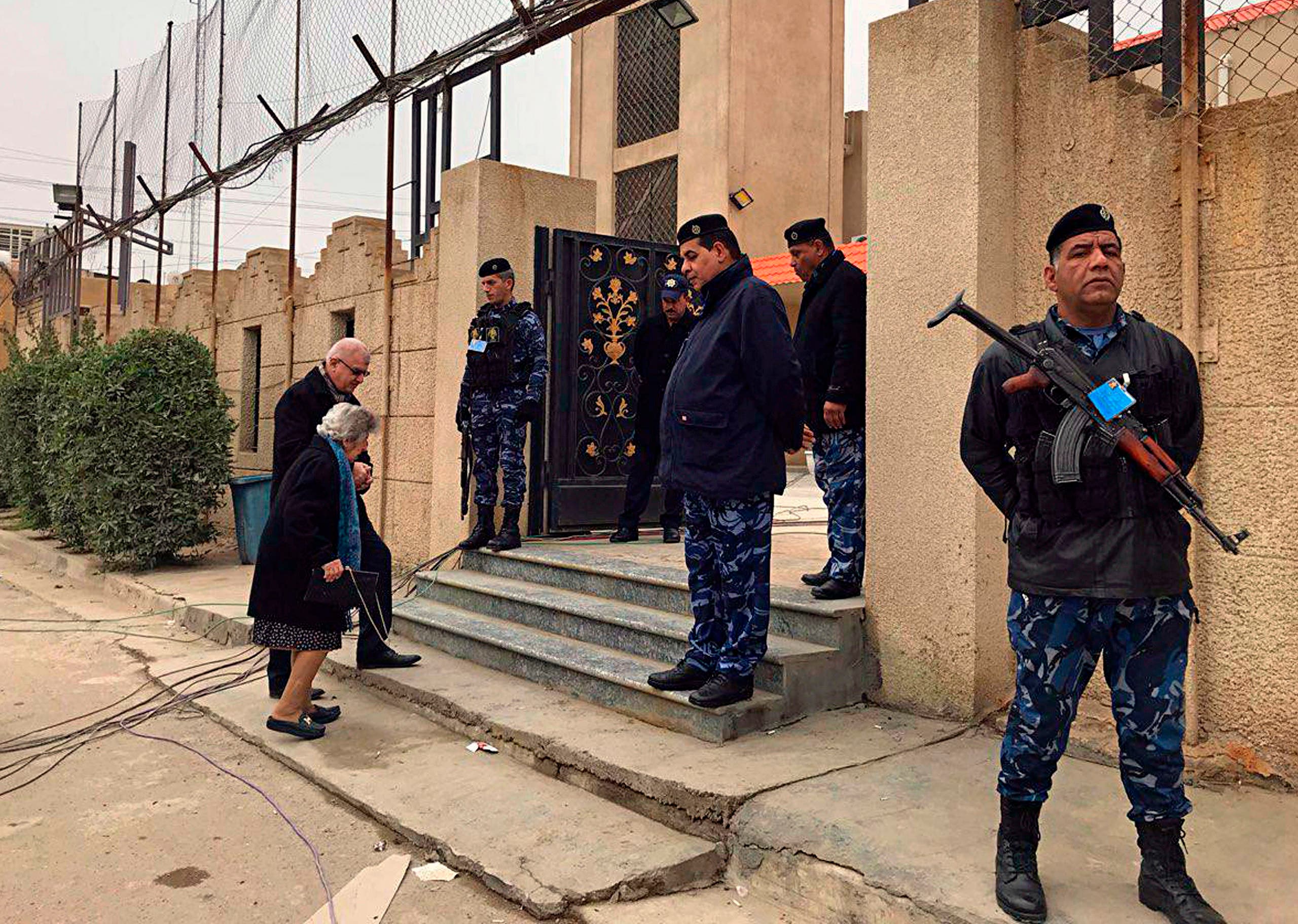 Security forces stand guard before Christmas Mass outside Mar Youssif Chaldean Church in Baghdad, Iraq on Dec. 25, 2018. (AP)