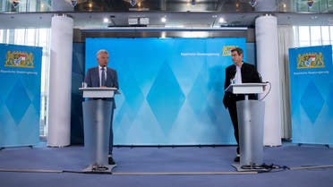 Bavarian State Prime Minister Markus Soeder and Munich mayor Dieter Reiter speak about cancelation of the Oktoberfest amid the coronavirus during a press conference in Munich. (Reuters)