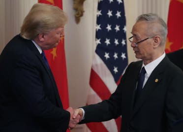President Donald Trump shakes hands with Chinese Vice Premier Liu He, before signing the phase 1 of a trade deal, at the White House, on January 15, 2020 in Washington, DC. (AFP)
