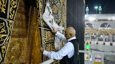 The General Presidency for the Affairs of the Two Holy Mosques's team cleans and sterilizes the cover (Kiswa) and surface of the Holy Kaaba in Mecca, Saudi Arabia, April 21, 2020. (Twitter) 1