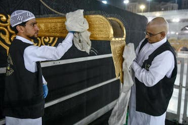 The General Presidency for the Affairs of the Two Holy Mosques's team cleans and sterilizes the cover (Kiswa) and surface of the Holy Kaaba in Mecca, Saudi Arabia, April 21, 2020. (Twitter) 2